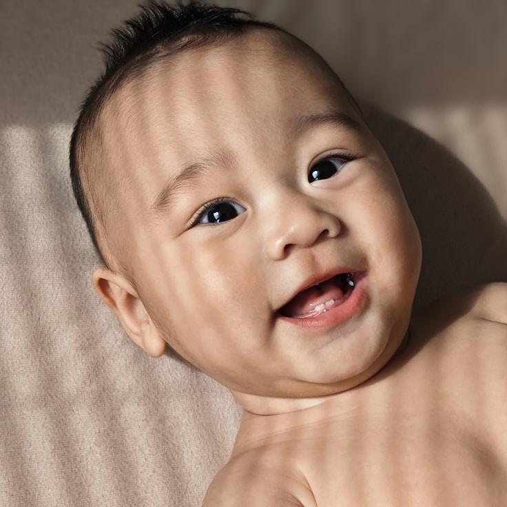 Kaveri Mehta, Lead Design Curator at QuietStillCalm, reviewing corporate floral arrangements